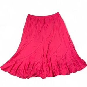 Pink midi skirt with elastic waistband and ruffle details.